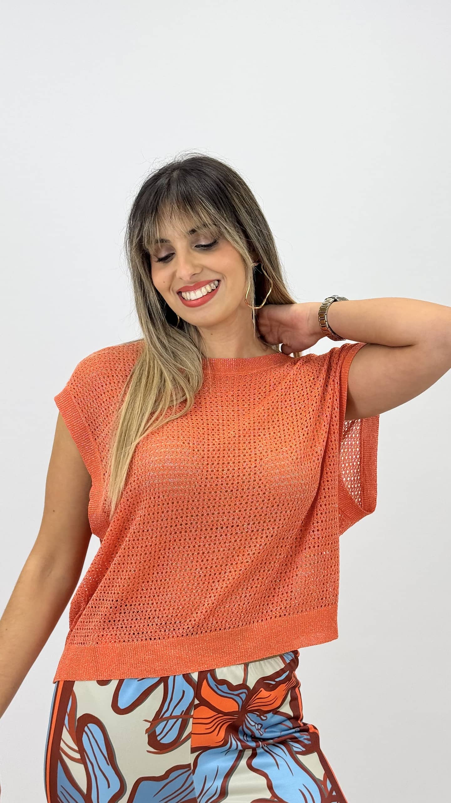 Blusa malha cavada perfurada laranja