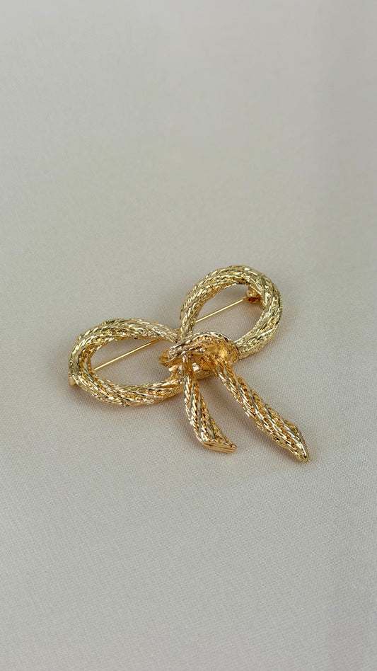 Alfinete laço dourado