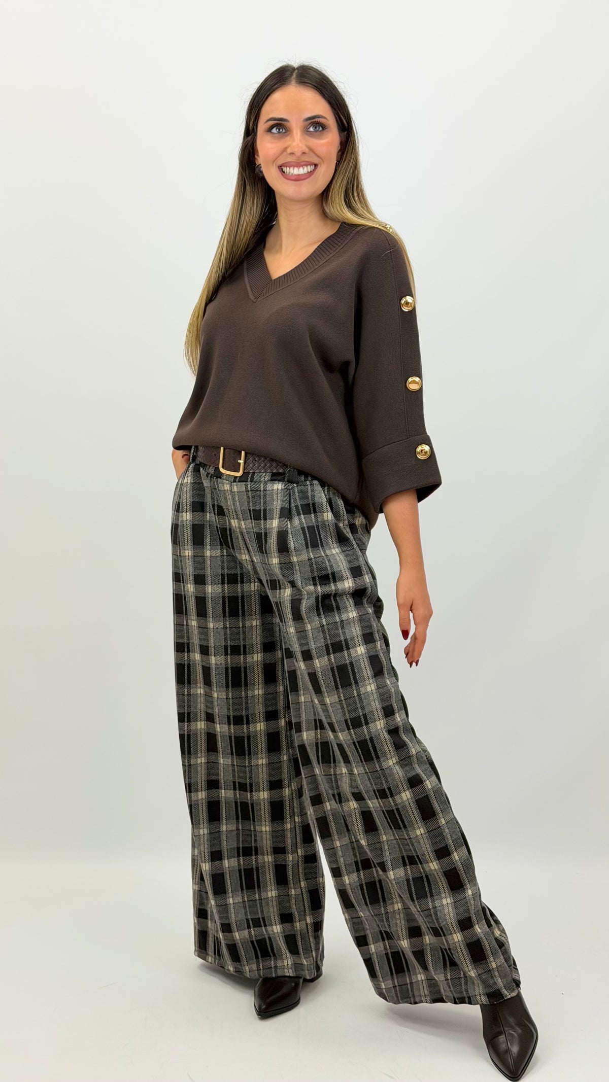 Calça estilo fazenda elástica xadrez cinza e castanho