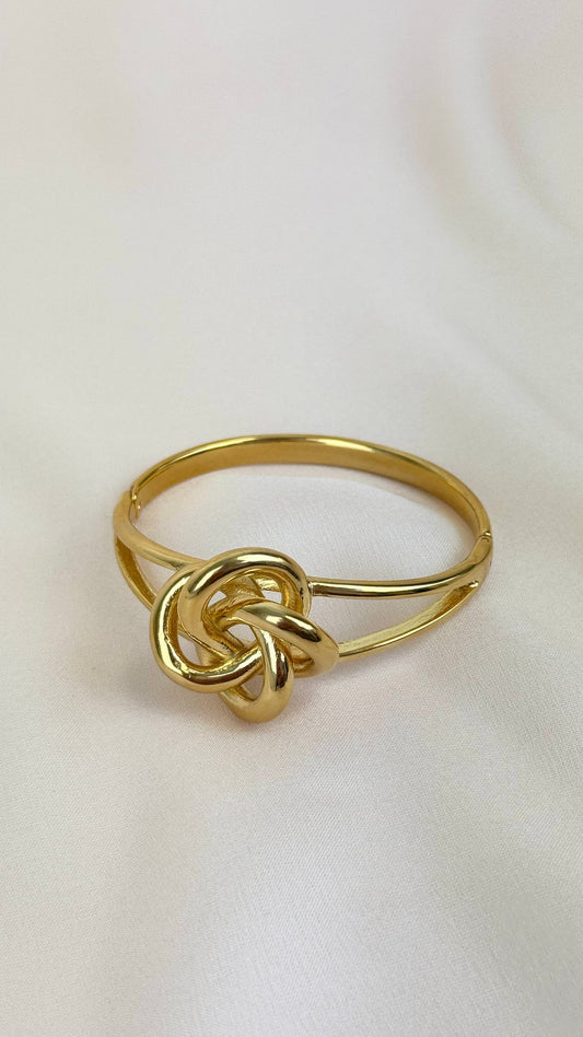 Pulseira aço dourado efeito nó