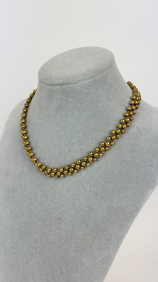 Colar de aço dourado bolinhas