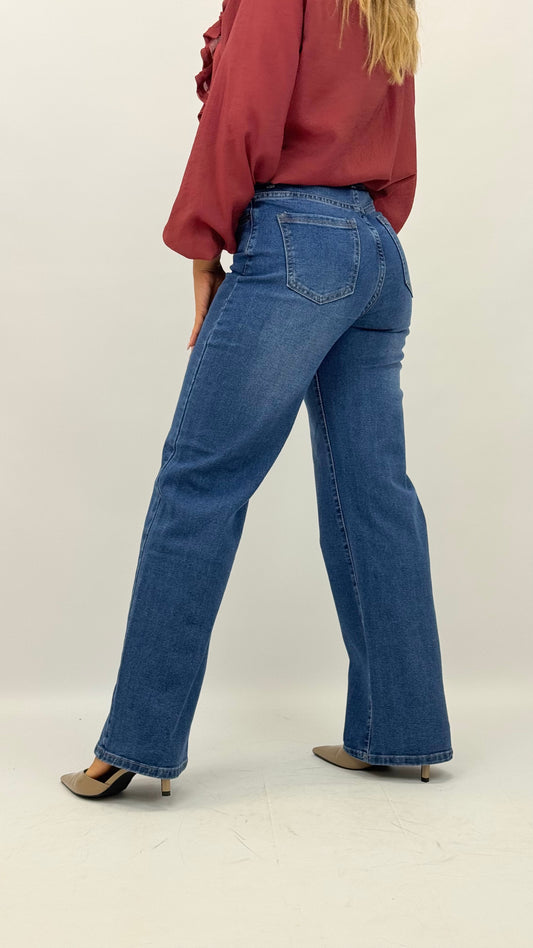 Calça ganga-escura elástica modelo wide-leg