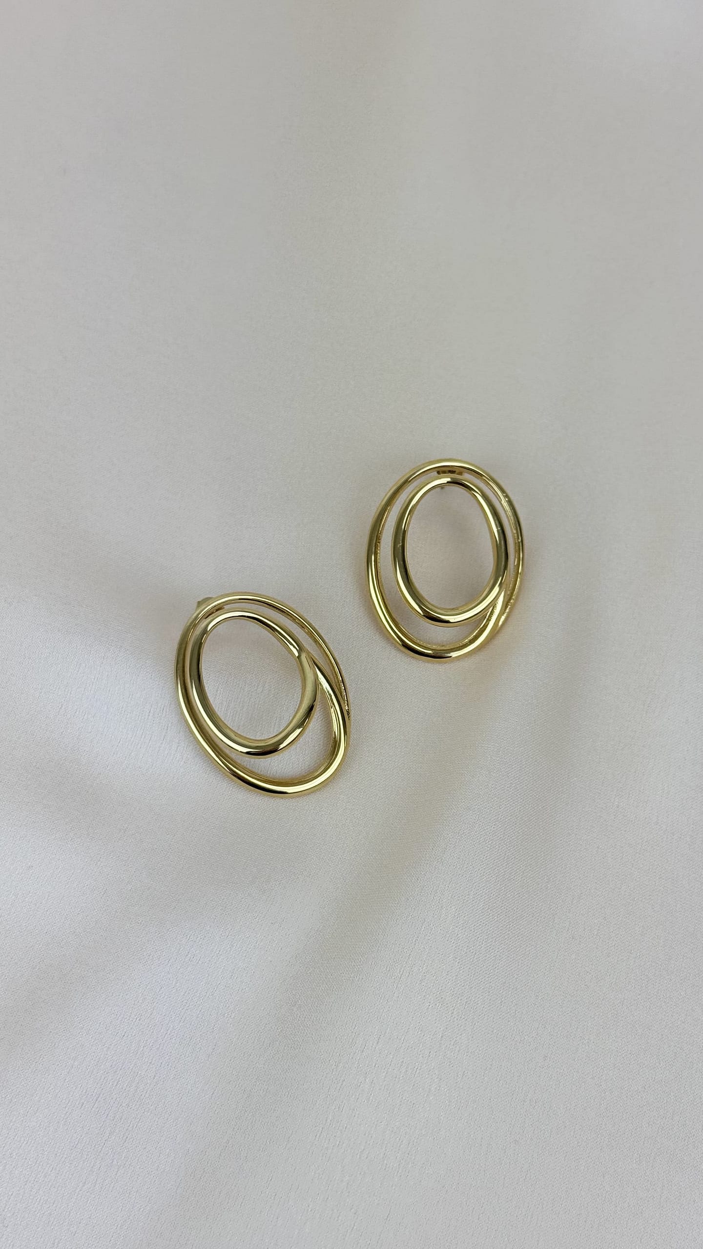 Brincos aço duas rodas dourado