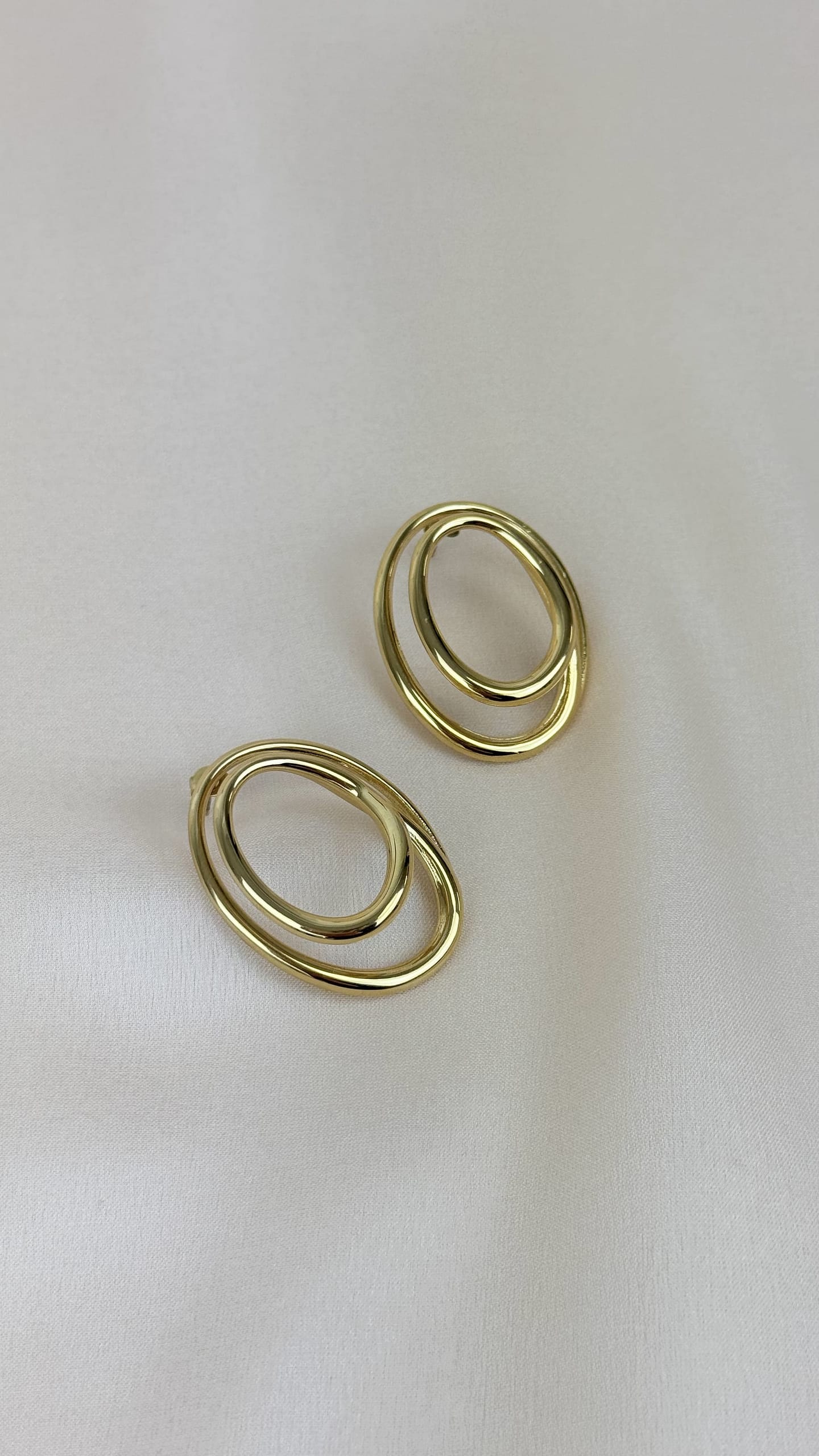 Brincos aço duas rodas dourado