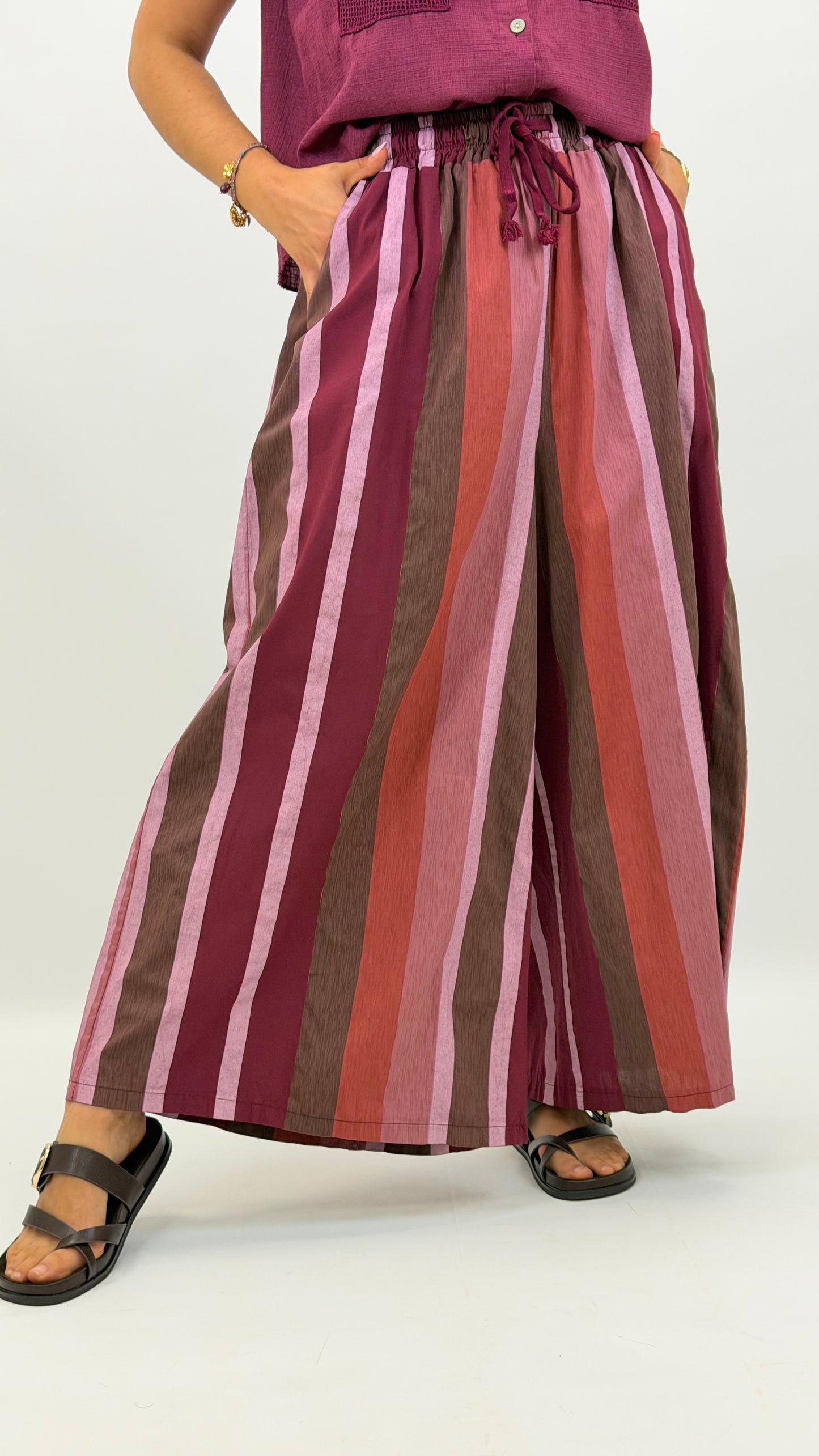 Pantalona estilo cullote riscas tons rosa e buganvilia