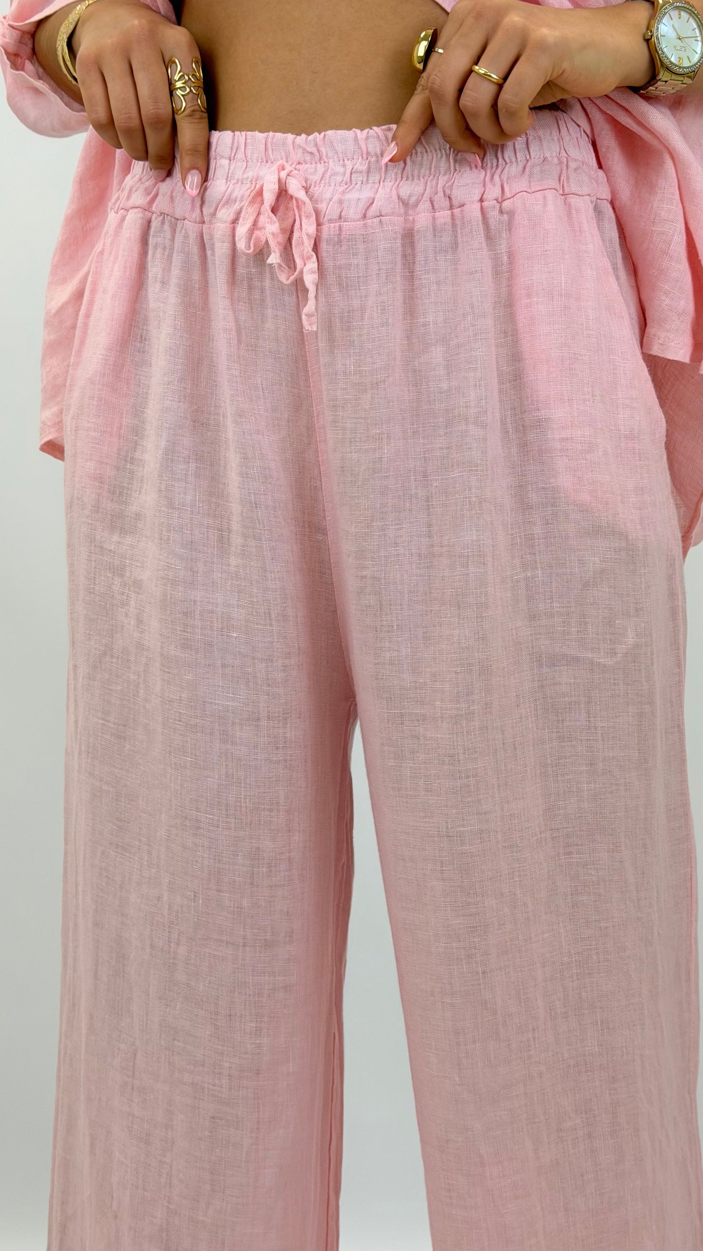 Calça linho rosa-bebé