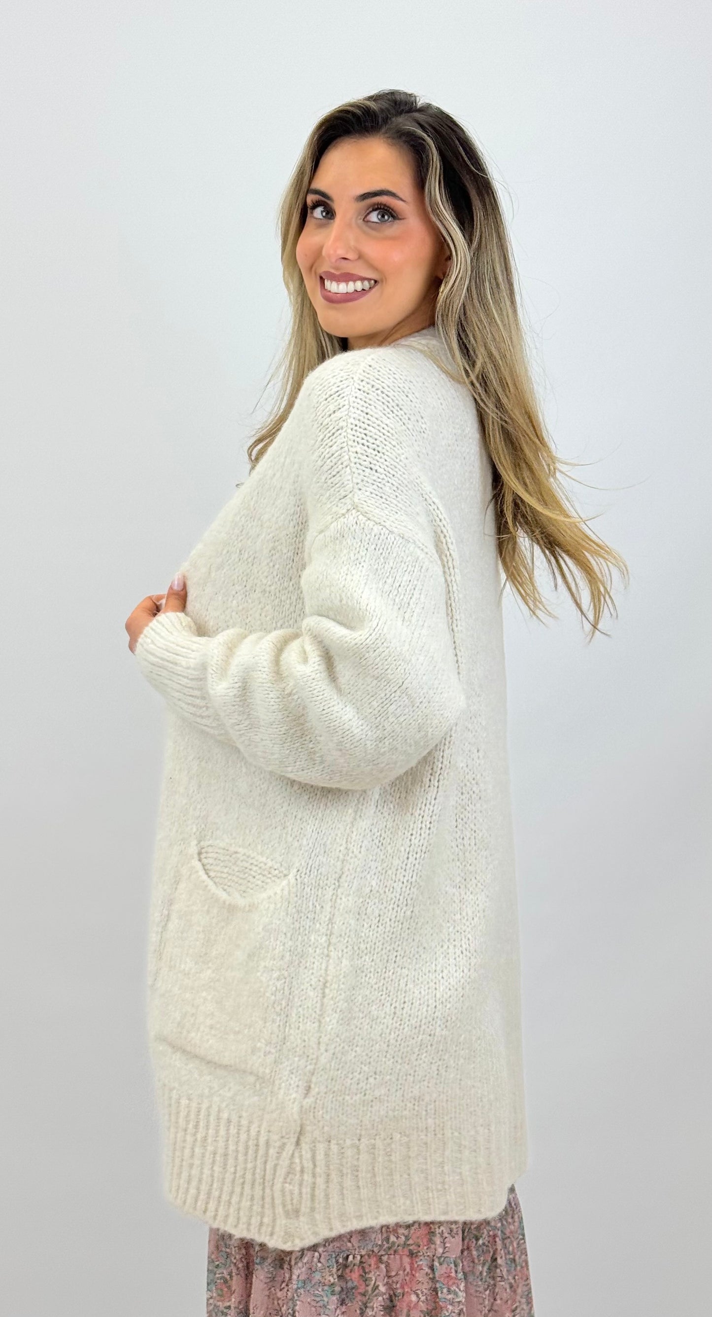 Casaco comprido com bolsos malha grossa pérola