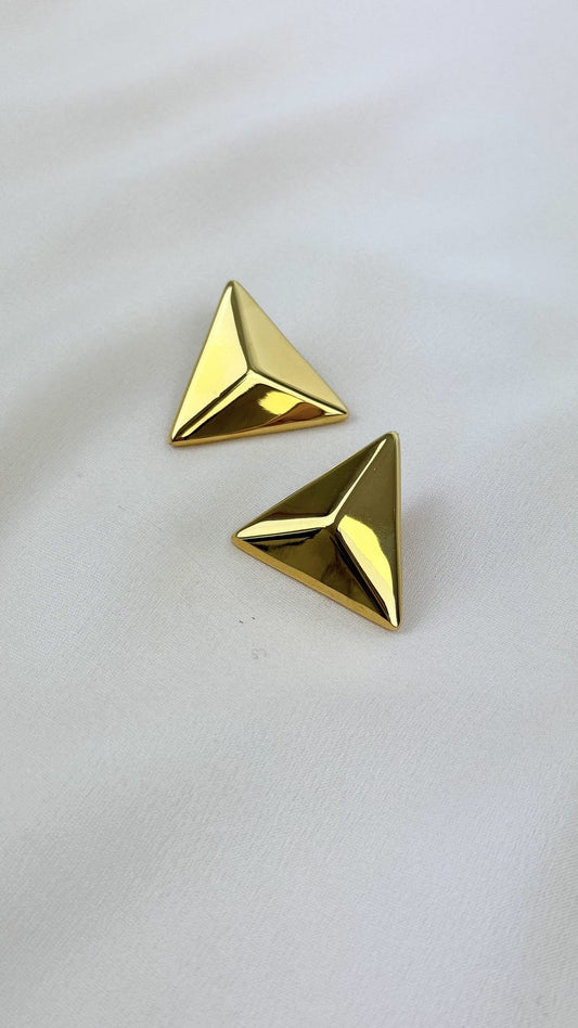 Brincos triângulo aço dourado