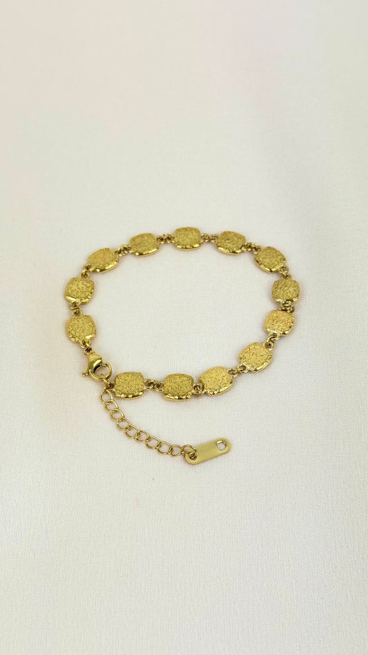 Pulseira chapinhas douradas