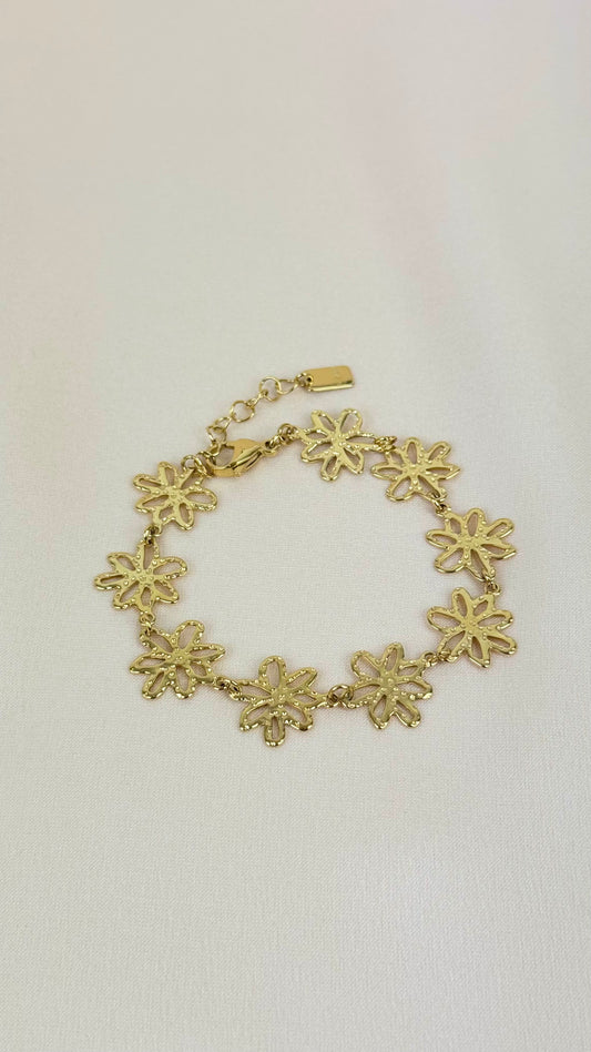 Pulseira dourada floral